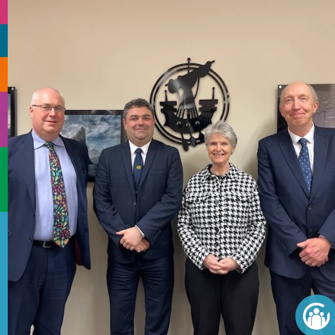 Image of four people facing the camera. They are standing side by side and smiling. From left to right they are: Comhairle Nan Eilean Siar Chief Executive Malcolm Burr, Comhairle Nan Eilean Siar Councillor Paul Steele, Accounts Commission Chair Jo Armstrong and Accounts Commission Deputy Chair Andrew Burns.