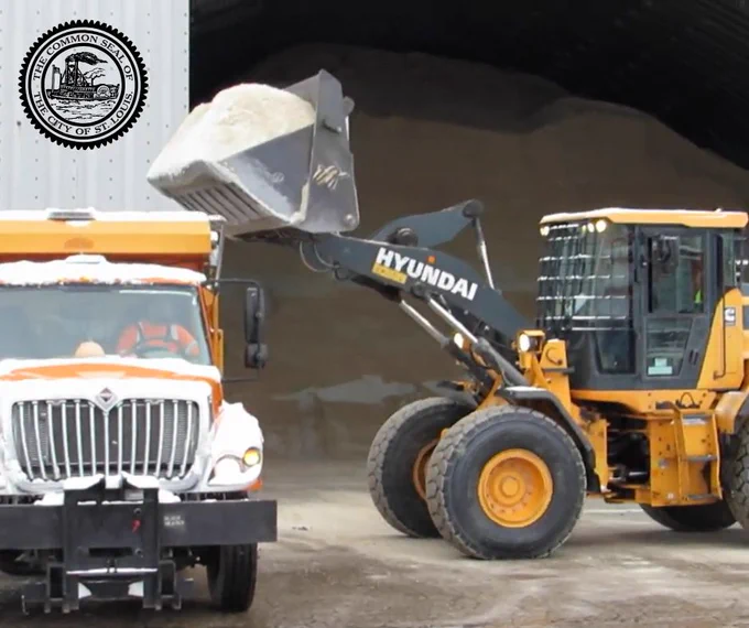 An image of a St. Louis Street Department salt truck being loaded.