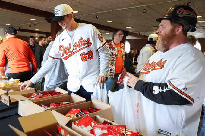 Tyler Wells participates in a community event.