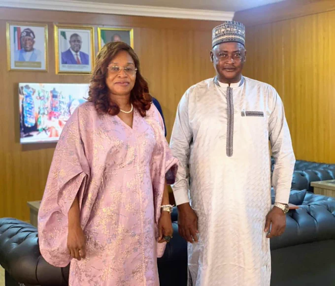 The Permanent Secretary MPR. Mrs. Patience N. Oyekunle (left) being welcomed by the Director - General  of Nigerian Nuclear Regulatory Authority (NNRA) Dr. Yau Idris (right) to the headquarters of the Authority during her familiarization visit to the Authority in Abuja.