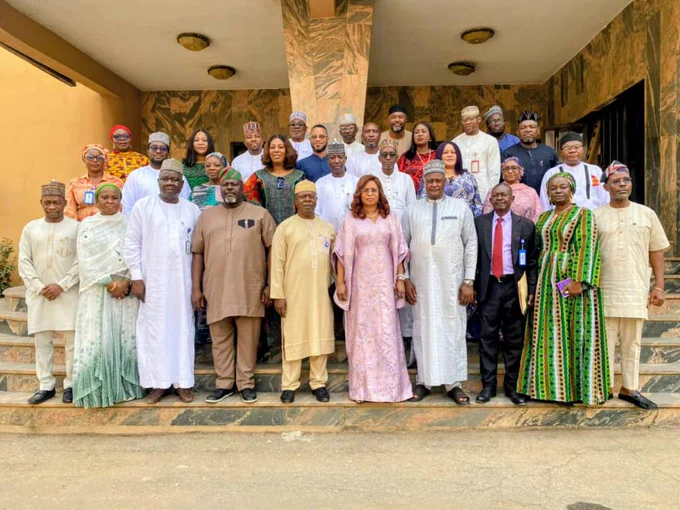 The Permanent Secretary MPR. Mrs. Patience N. Oyekunle (5th right) flanked by the Director - General of Nigerian Nuclear Regulatory Authority (NNRA) Dr. Yau Idris (4th right) and the management team of MPR and NNRA in a group photograph during the familiarization visit.