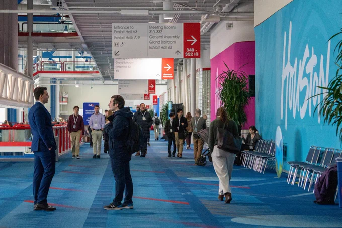 Attendees walking down the hallway.