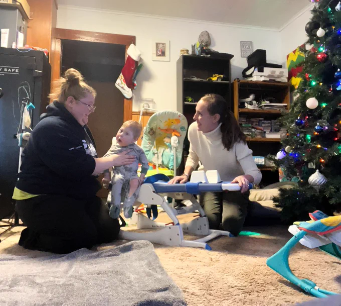 CRAEA PT supporting a student with their family at a home visit