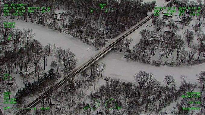 frozen water underneath bridge