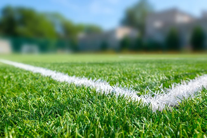 Corner of grass football pitch