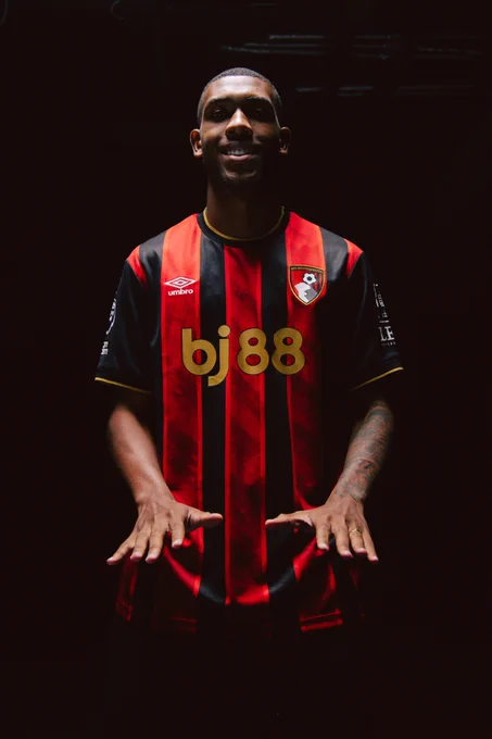 Rayan poses to camera in AFC Bournemouth kit.