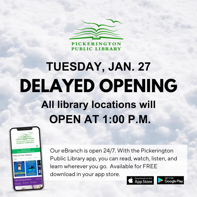 Snowy background. Cell phone displaying the Pickerington Public Library app.