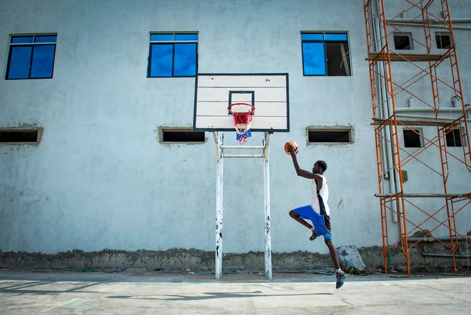 A man playing basketball in Juba, South Sudan, in 2017. Stock photo. 