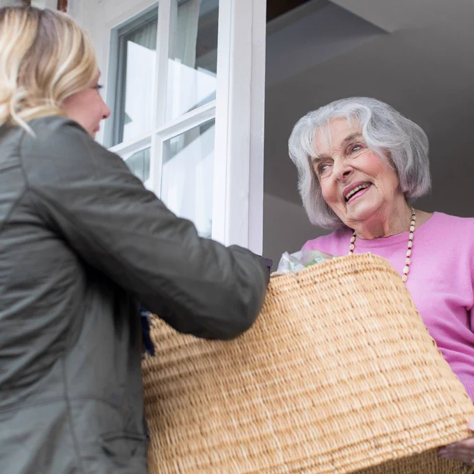 Younger woman check on senior woman.