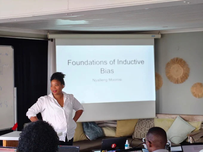 Dr. Nyalleng Moorosi is talking abut inductive biases.