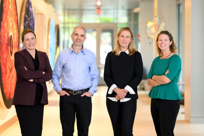 The MIT HEALS Leadership team poses in the Koch Institute Galleries: (left to right) Angela Koehler, Iain Cheeseman, and Katharina Ribbeck, with Senior Program Manager Caroline Lowenthal.