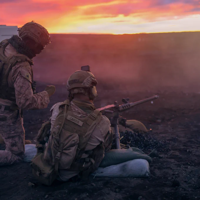 U.S. Marine Corps Cpl. Jasiah Shepherd, left, and Pfc. Joseph Canter, both machine gunners with 3rd Littoral Combat Team, 3rd Marine Littoral Regiment, 3rd Marine Division, adjust fire on a M2 .50 caliber machine gun during a live-fire training event at Pohakuloa Training Area, Hawaii, Jan. 15, 2026. The training exercise at PTA refined weapon system and tactical proficiency, strengthening overall combat readiness and preparing 3rd LCT for future operational requirements. Shepherd is a native of Florida and Canter is a native of Ohio. (U.S. Marine Corps photo by Cpl. Ernesto Lagunes)