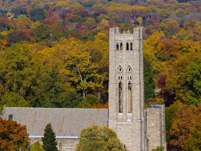 Clothier Tower surrounded by fall foliage.