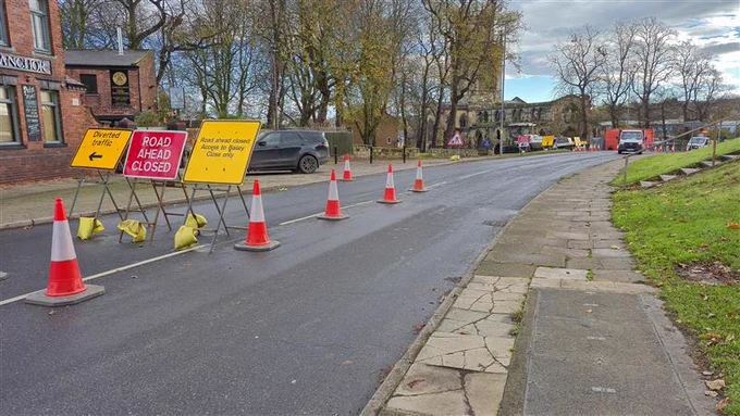 Part of North Baileygate by the Hope and Anchor pub, with road signs saying road ahead closed - you can still reach our car park from this side however