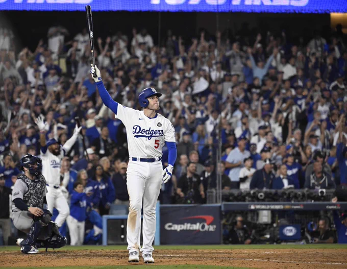 Freddie Freeman, hitting the first walk-off grand slam in World Series history