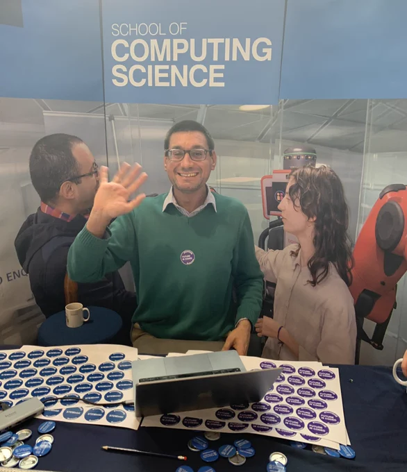 Lecturer from Computing Science waving