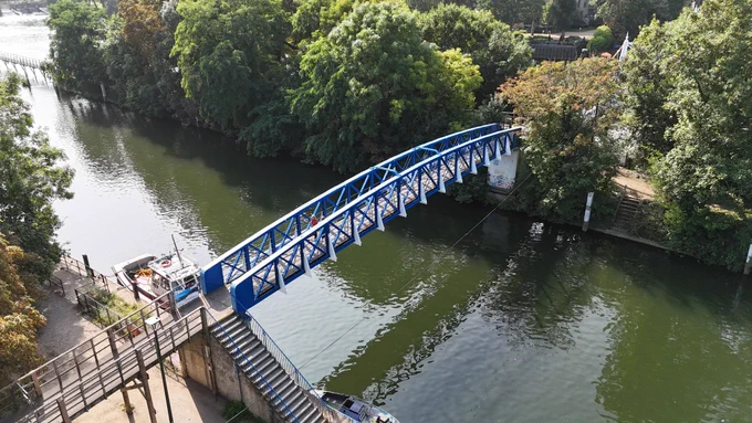 A photo taken from above of lock cut bridge over Teddington Lock.