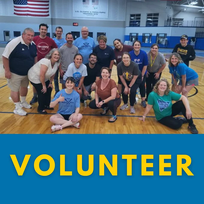 "Volunteer" is written under a picture of a large group of people in the turnstone fieldhouse after an event. 