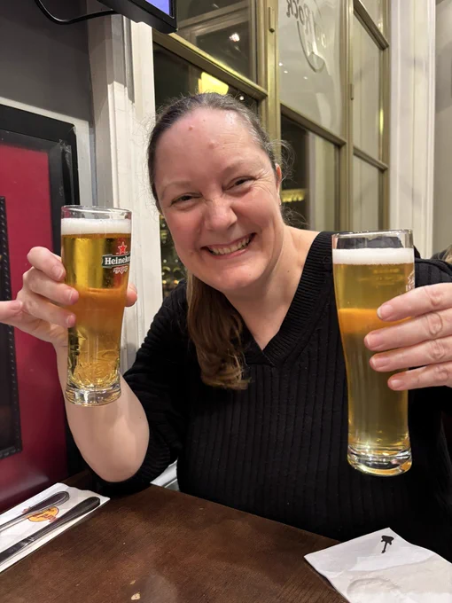 Zoe the nurse nursing two drinks