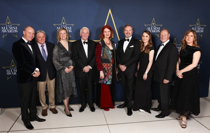 A group photo of all 2024 UCD Alumni Awardees in front of the Alumni Awards 2024 wall.