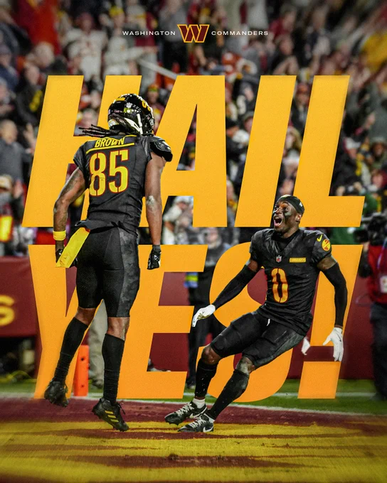 Photo of Noah Brown and Mike Sainristil after Noah Brown caught a game-winning touchdown. Behind them it says "HAIL YES" in gold text. At the top in the center it says "WASHINGTON COMMANDERS" with the Commanders W logo between the two words.