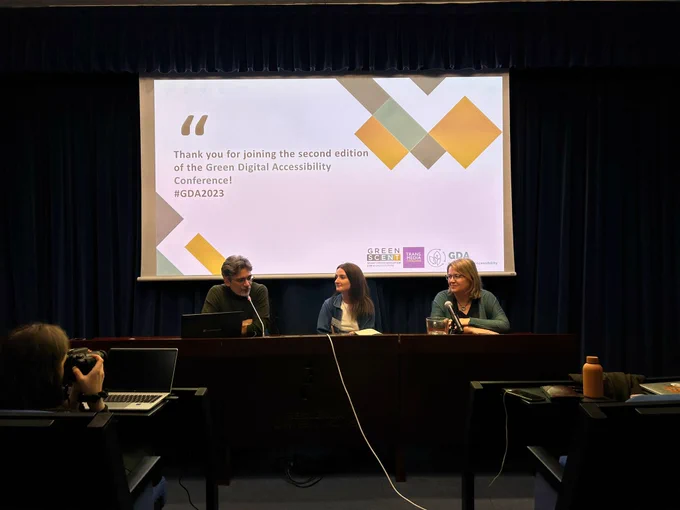 Alessandro Caforio, Sarah McDonagh and Anna Matamala are sitting at the Conference table.
