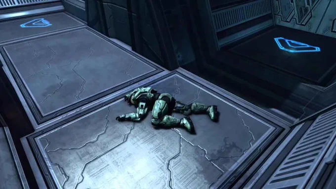 An image of a spartan from Halo lying on the floor, face down, after being eliminated
