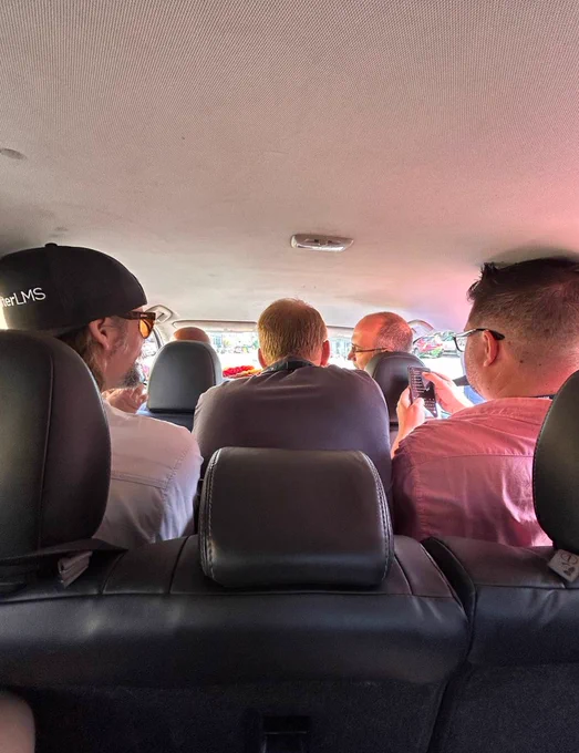Me (shortest guy there), crammed in the back seat of a 7-seater! This never happens!!