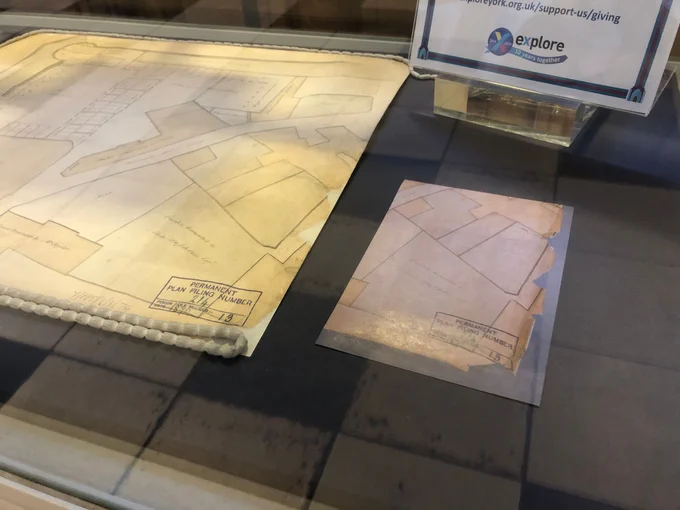 The corner of the conserved plan next to a photograph of the corner before it underwent conservation work. The plan in the 'before' picture is ripped, teared and dirty.