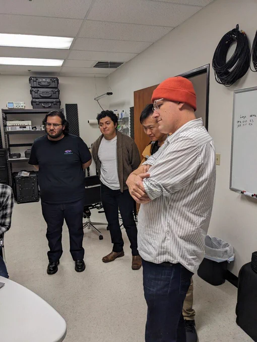 people standing inside a room