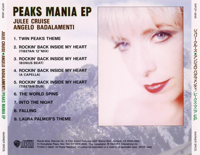 Back of “Peaks Mania EP” CD with and track listing and Julee Cruise’s image against Mount Si
