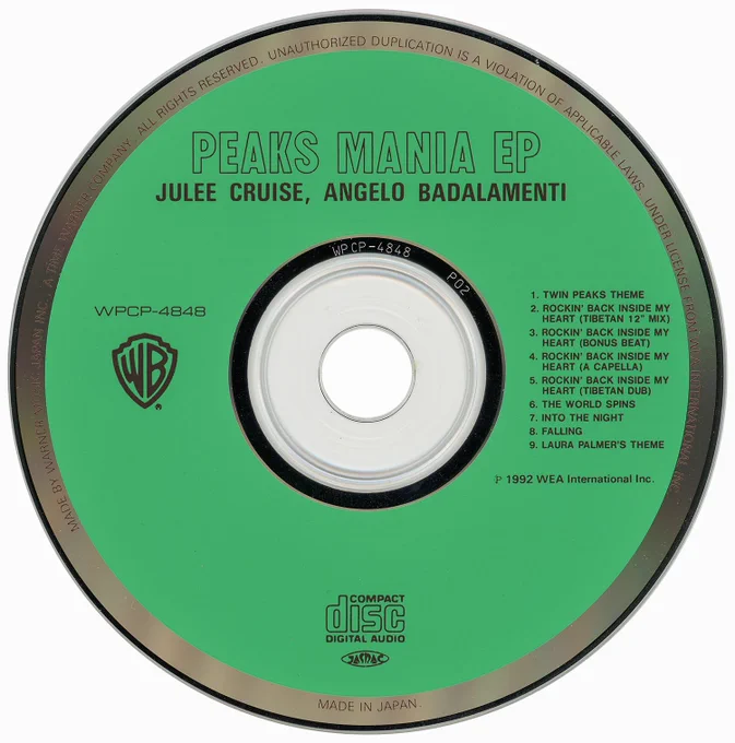 Peaks Mania EP green compact disc