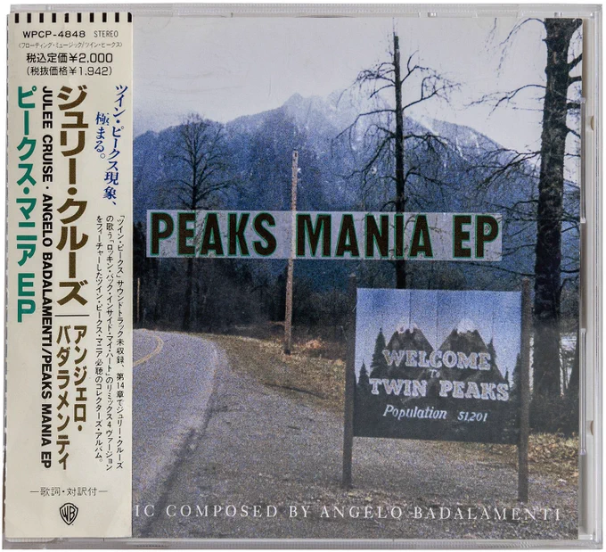 Cover of Peaks Mania EP with Welcome to Twin Peaks sign and Japanese obi strip