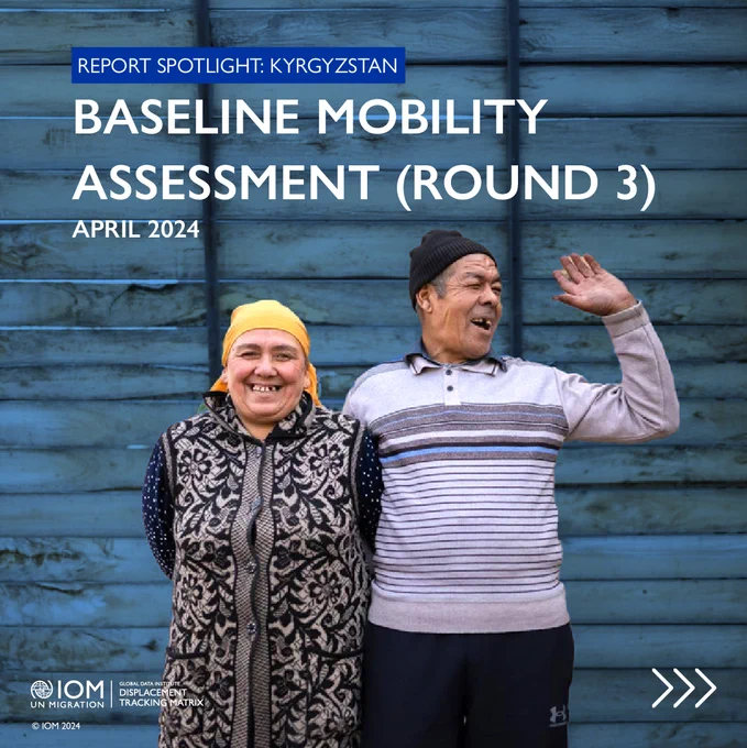 A smiling couple stands in front of a blue wooden wall. The woman wears a yellow headscarf, and the man raises his hand. The image promotes the 'Baseline Mobility Assessment (Round 3)' in Kyrgyzstan, April 2024. A logo at the bottom left includes IOM UN Migration, Global Data Institute and Displacement Tracking Matrix.