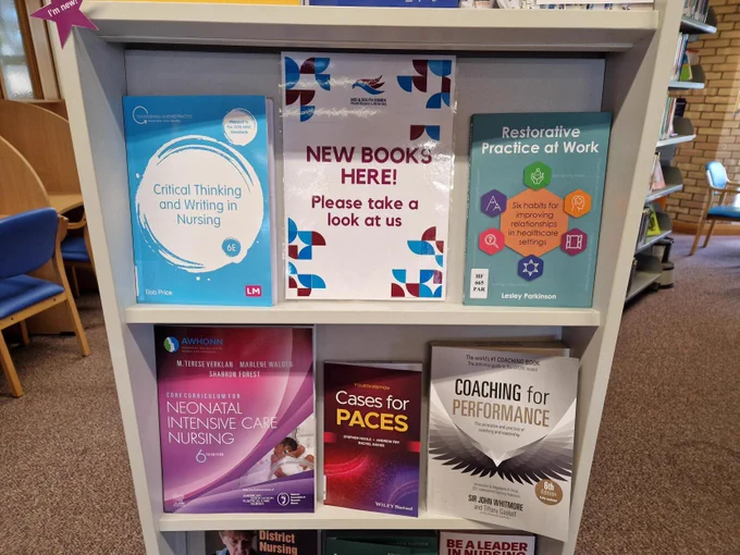 New books displayed on shelves.