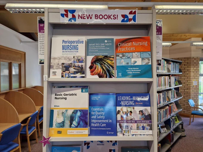New books displayed on shelves.