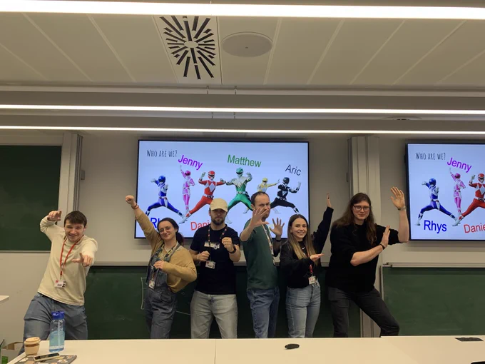 Our presenters posing for a photo after the talk. Left to right; Rhys, Jenny, Daniel, Matthew, Elin, Aric.