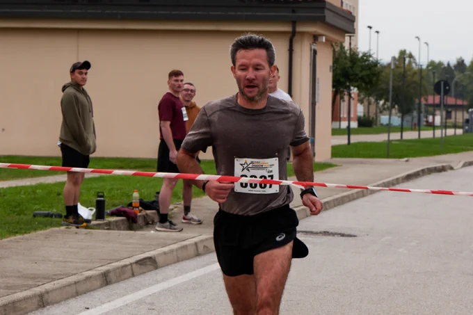 Vicenza military community members participate in the Army Ten-Miler shadow run as a tag at Caserma Del Din, Vicenza, Italy, Oct. 16, 2024. The shadow run mirrors the Army Ten-Miler held annually in Washington D.C., providing an opportunity for service members and civilians stationed overseas to participate, fostering camaraderie and physical fitness. (U.S. Army photo by Spc. Ivan Hernandez) 