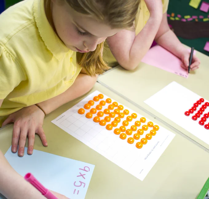 Pupil working at desk