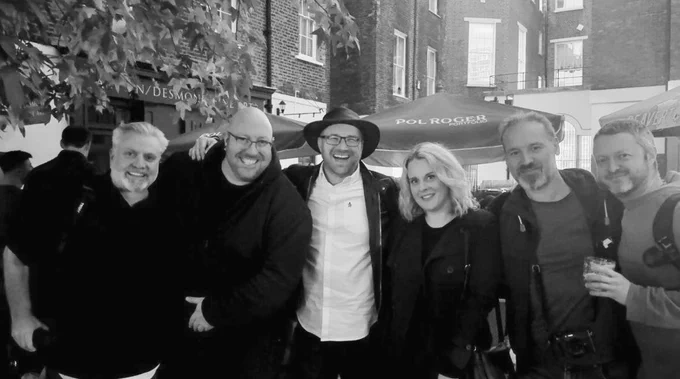 Photo of the people mentioned in the tweet (yes tweet) taken by a passer-by with Supertanskiii's phone in almost darkness with little to no light. Sounds like the future of things to come of we don't get together in groups like this in an attempt to change things for the better.