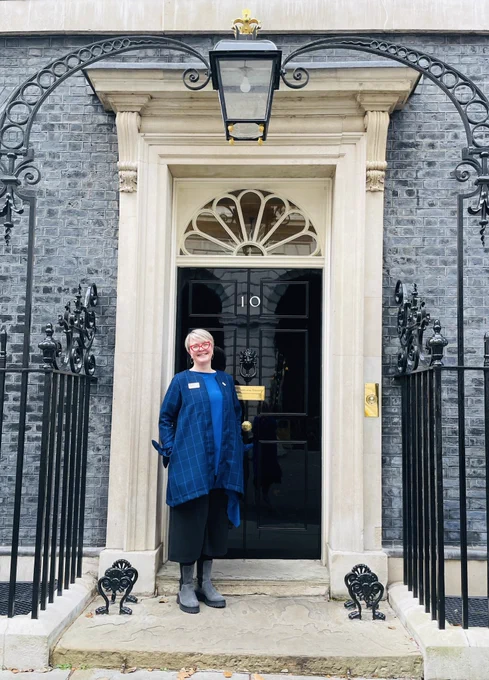 Kate, standing in front of the door to 10 Downing Street