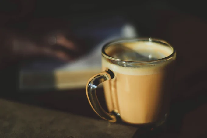 Photograph of a cup of coffee by Natalie Grainger to imply rest and relaxation as you catch up with the latest Books for Keeps features.