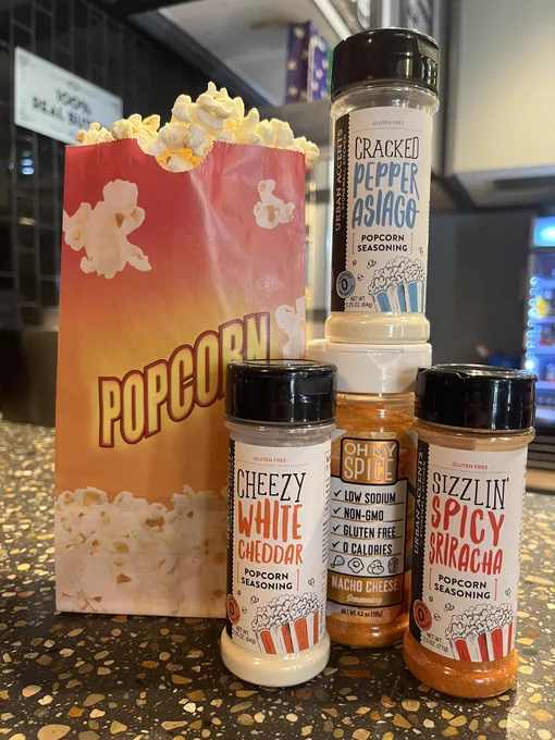 Popcorn with four seasoning bottles