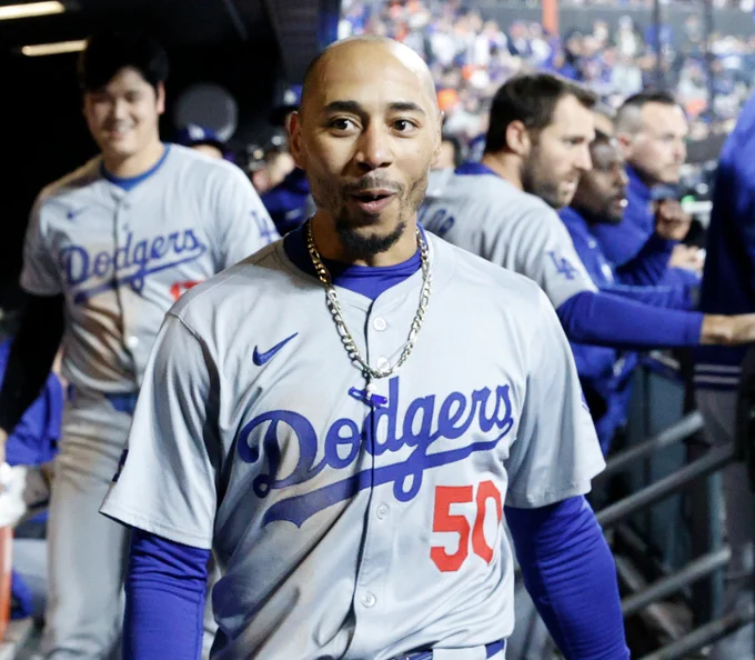 Mookie Betts in the Dodgers dugout in NLCS Game 4, as Shohei Ohtani looks on