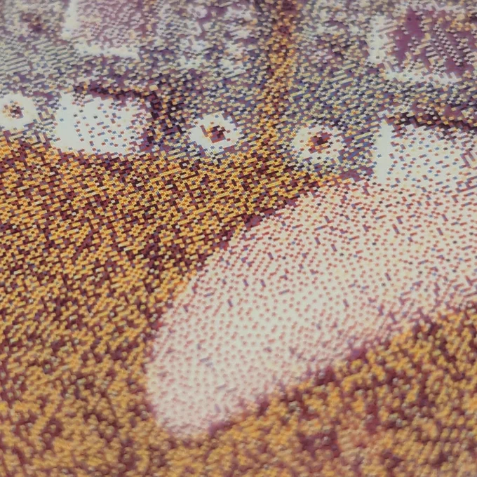 A close up shot of colorful pixels on an epaper display