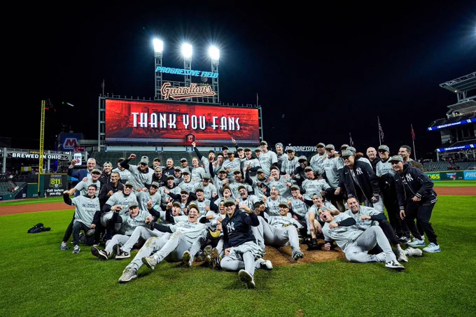 Yankees celebrate on Progressive Field after clinching the American League Pennant. 
