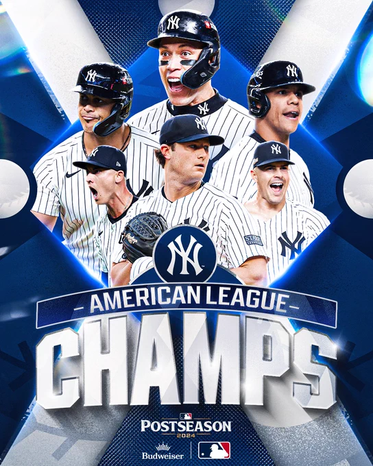 American League Champs
New York Yankees
Postseason 2024
Presented by Budweiser
Pictured: Cutouts of Giancarlo Stanton, Aaron, Judge, Juan Soto, Luke Weaver, Gerrit Cole and Carlos Rodón. They are all wearing white pinstriped Yankees uniforms.