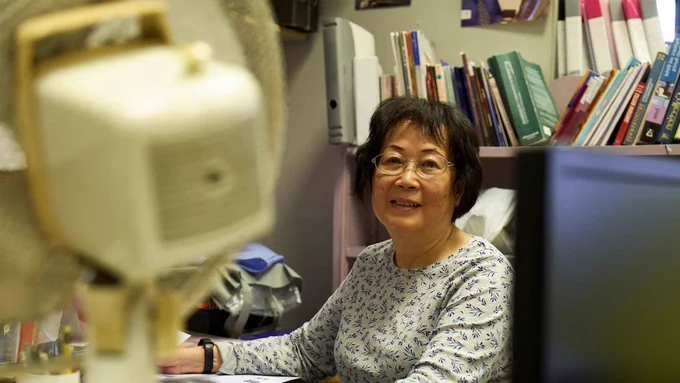Older woman working in an office