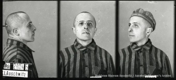 A mugshot registration photograph from Auschwitz. A man with a shaved head wearing a striped uniform photographed in three positions (profile and front with bare head and a photo with a slightly turned head with a hat on). The prisoner number is visible on a marking board on the left.