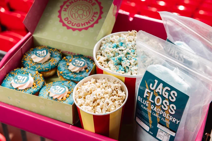 A platter featuring doughnuts, Popcorn and the Jags floss. 